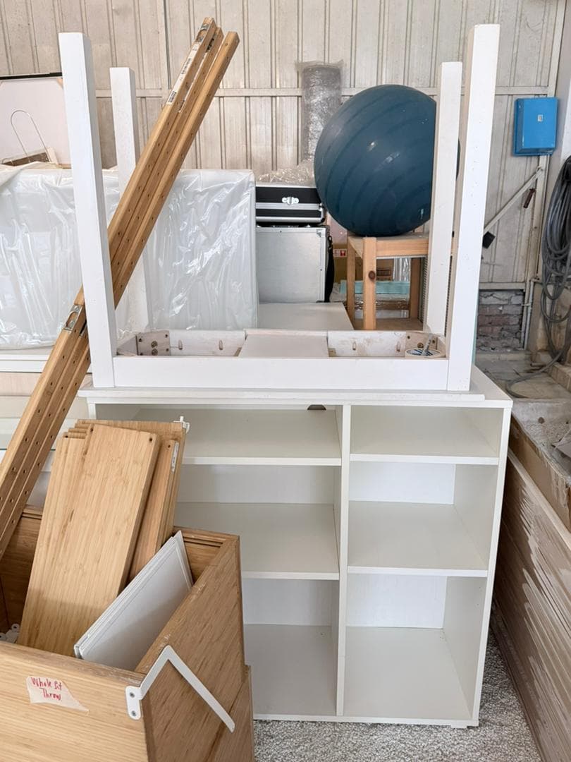 Business clear-out in progress with bags and bulky items